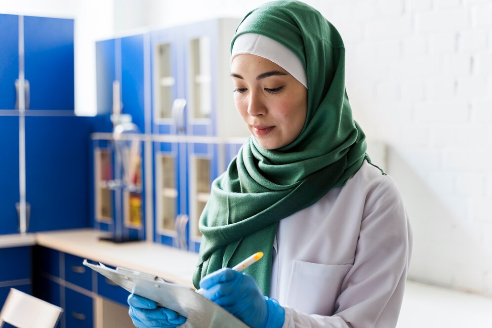 side-view-female-scientist-with-hijab-notepad_23-2148491999.jpg